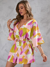 Vestido con puños y estampado geométrico